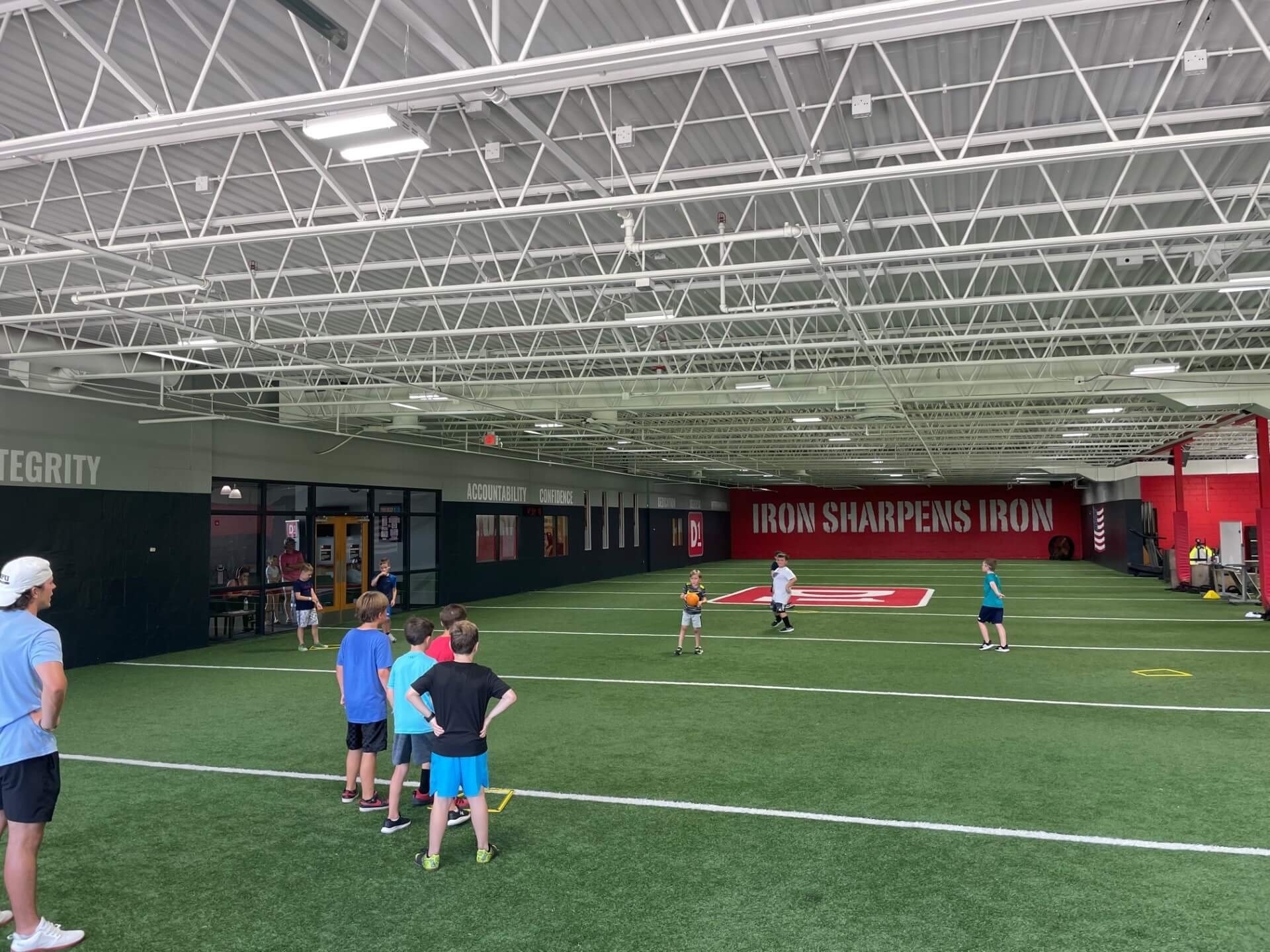 Kids playing on the indoor field at D1 Training St. Louis West