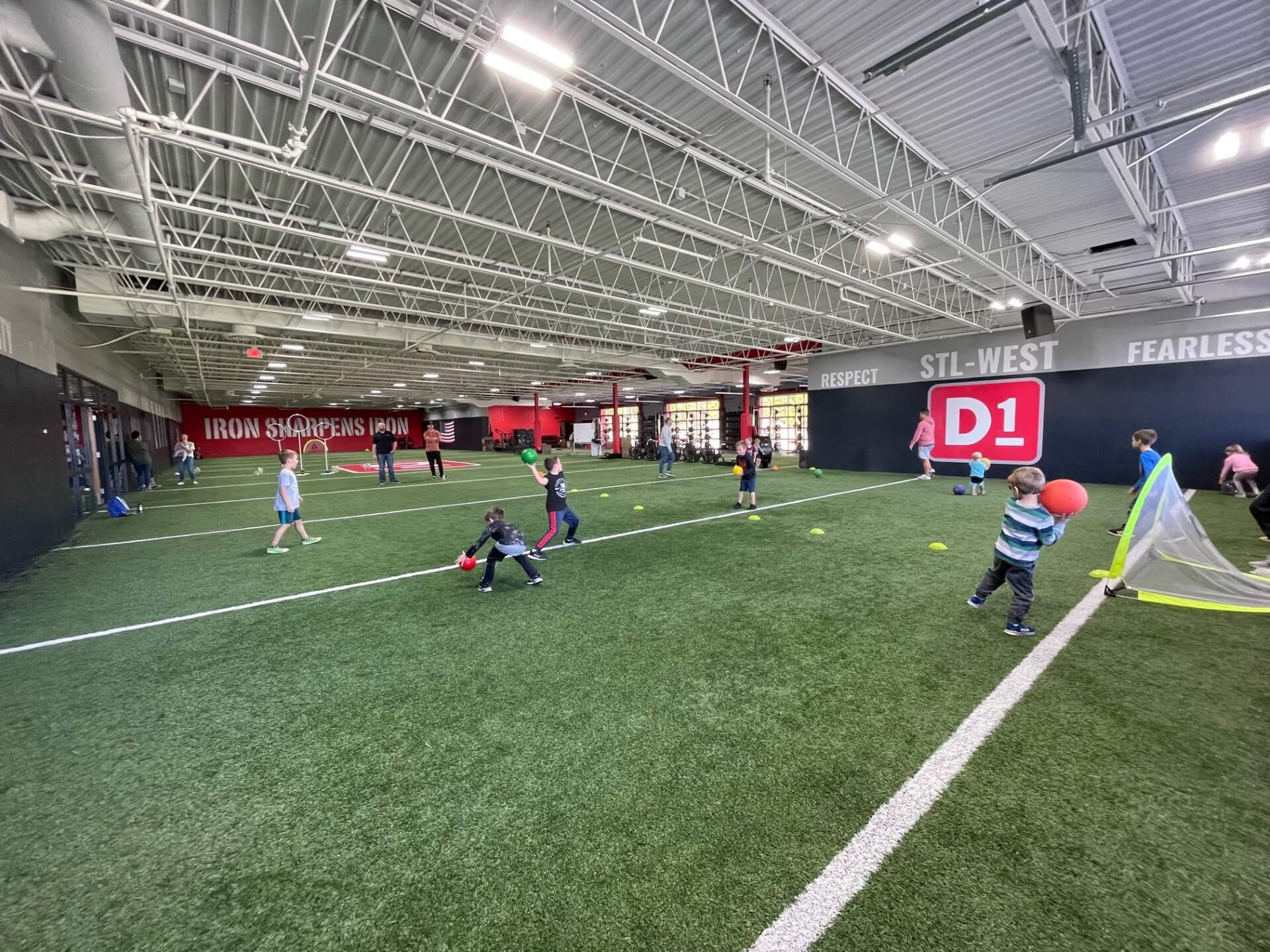 Kids playing on the indoor field at D1 Training St. Louis West