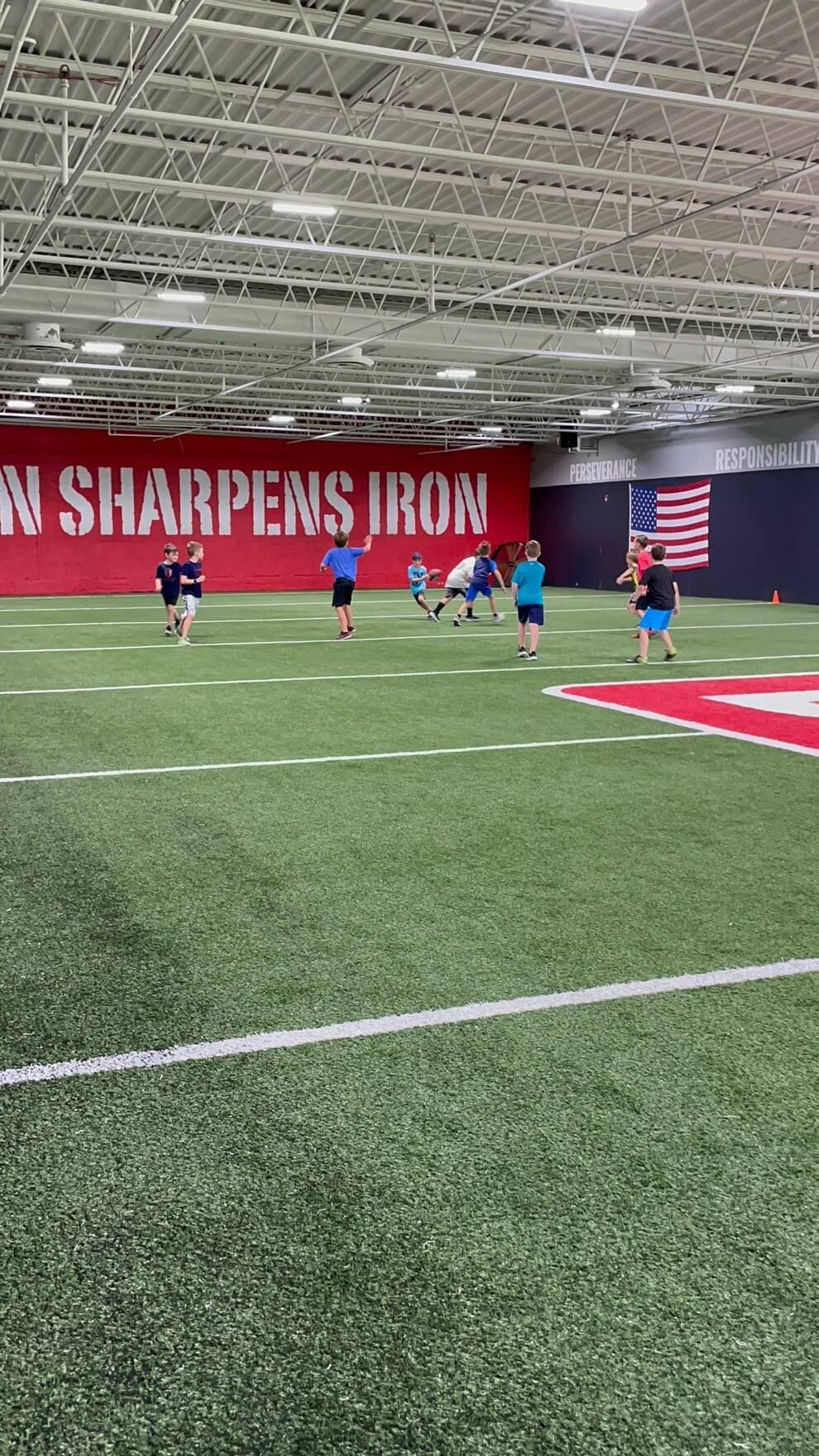 Kids playing on the indoor field at D1 Training St. Louis West