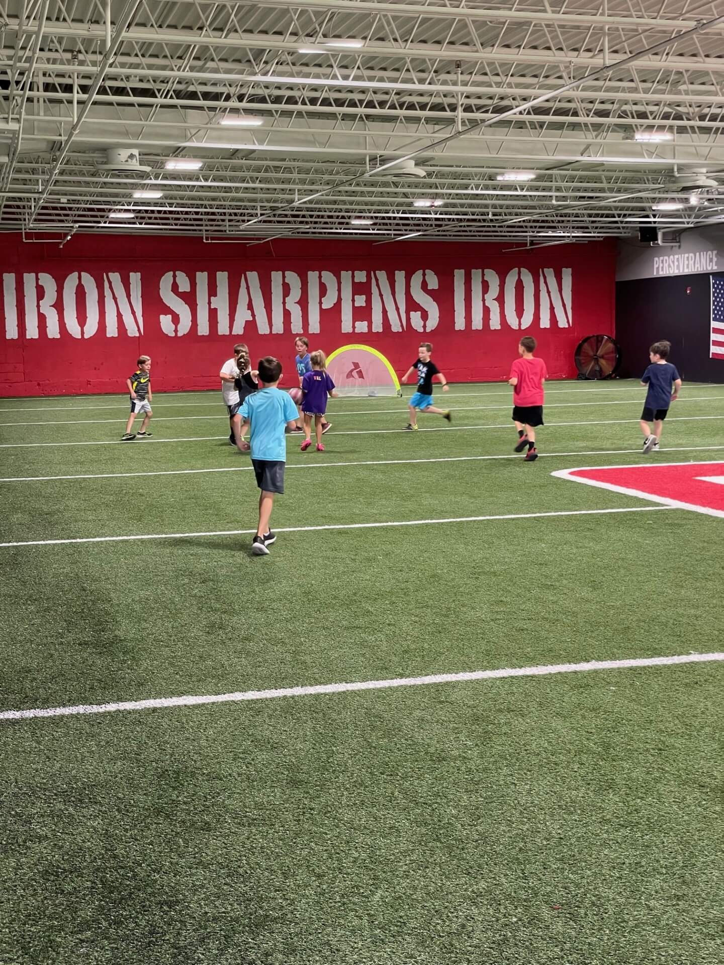 Kids playing on the indoor field at D1 Training St. Louis West