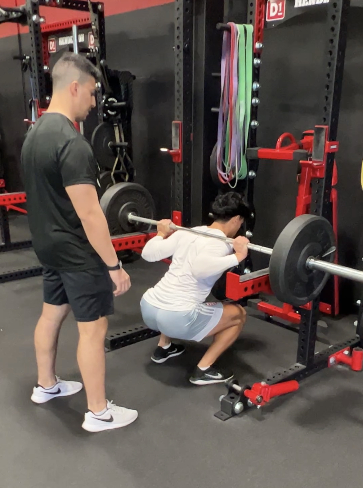 photo of woman doing a squat